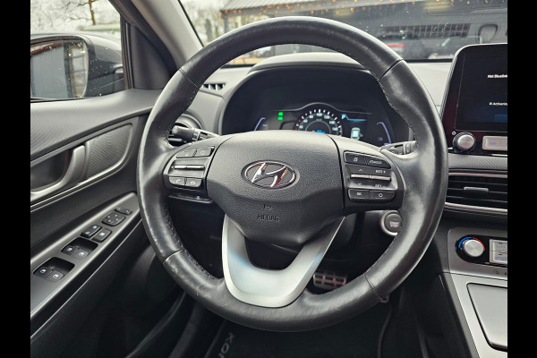 Hyundai Kona EV Comfort 39 kWh | SOH 98% | Stoelverwarming | Krell | Navi |  All-seasons | Camera | Stuurverwarming | Rijklaar |