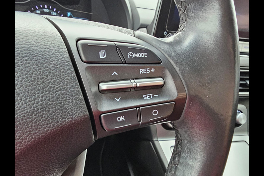 Hyundai Kona EV Comfort 39 kWh | SOH 98% | Stoelverwarming | Krell | Navi |  All-seasons | Camera | Stuurverwarming | Rijklaar |
