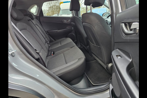 Hyundai Kona EV Comfort 39 kWh | SOH 98% | Stoelverwarming | Krell | Navi |  All-seasons | Camera | Stuurverwarming | Rijklaar |