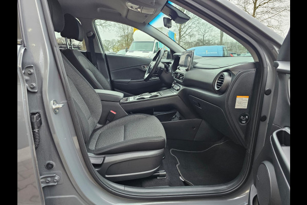 Hyundai Kona EV Comfort 39 kWh | SOH 98% | Stoelverwarming | Krell | Navi |  All-seasons | Camera | Stuurverwarming | Rijklaar |