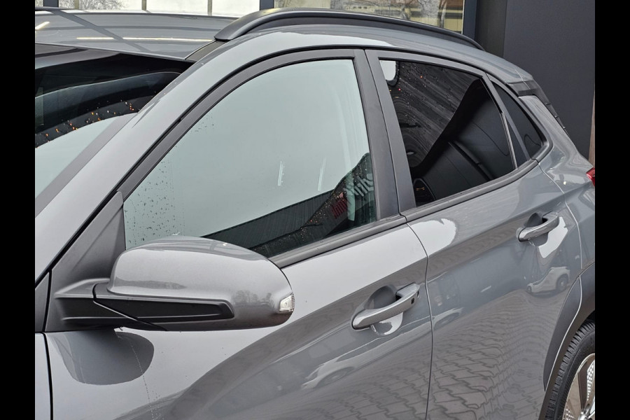 Hyundai Kona EV Comfort 39 kWh | SOH 98% | Stoelverwarming | Krell | Navi |  All-seasons | Camera | Stuurverwarming | Rijklaar |