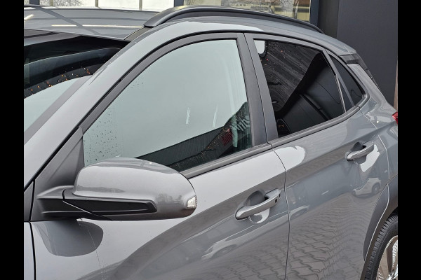 Hyundai Kona EV Comfort 39 kWh | SOH 98% | Stoelverwarming | Krell | Navi |  All-seasons | Camera | Stuurverwarming | Rijklaar |