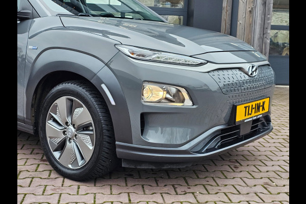 Hyundai Kona EV Comfort 39 kWh | SOH 98% | Stoelverwarming | Krell | Navi |  All-seasons | Camera | Stuurverwarming | Rijklaar |