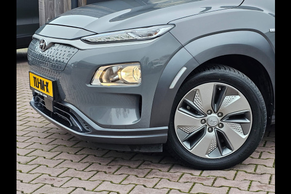 Hyundai Kona EV Comfort 39 kWh | SOH 98% | Stoelverwarming | Krell | Navi |  All-seasons | Camera | Stuurverwarming | Rijklaar |