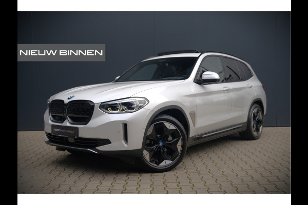 BMW iX3 High Executive 80 kWh | Panoramadak | Keyless | Stoelverwarming | Harman Kardon | Memory Seat | Head-Up Display | 360 Camera | Adaptief Onderstel | Trekhaak | Adaptive LED | Elektrische Stoelen | Apple Carplay | N
