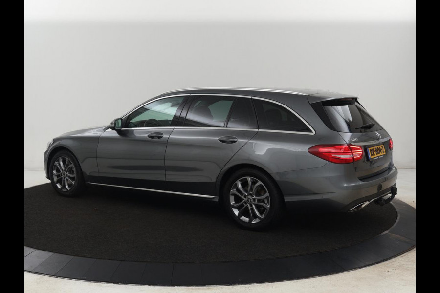 Mercedes-Benz C-Klasse 180 Business Solution | Stoelverwarming | Trekhaak | Camera | Navigatie | Park Assist | Half leder | Climate control | Full LED | Cruise control | Dodehoek detectie