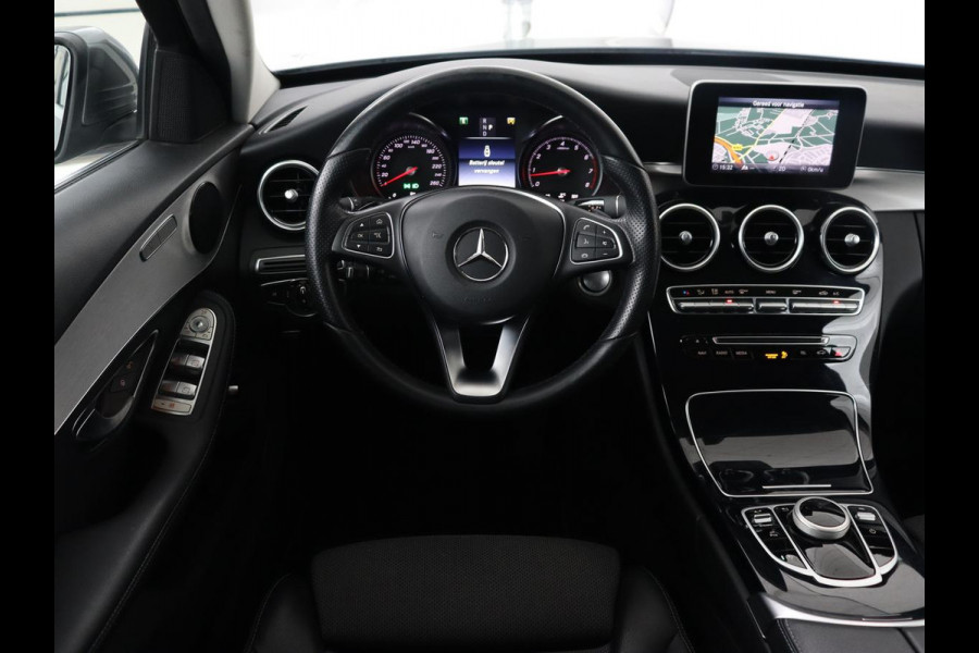 Mercedes-Benz C-Klasse 180 Business Solution | Stoelverwarming | Trekhaak | Camera | Navigatie | Park Assist | Half leder | Climate control | Full LED | Cruise control | Dodehoek detectie