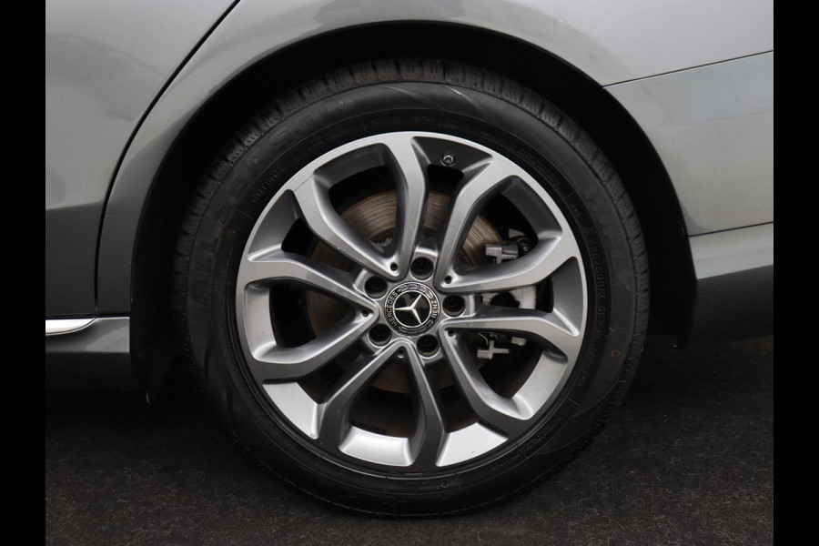 Mercedes-Benz C-Klasse 180 Business Solution | Stoelverwarming | Trekhaak | Camera | Navigatie | Park Assist | Half leder | Climate control | Full LED | Cruise control | Dodehoek detectie