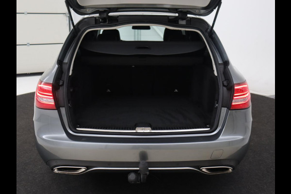 Mercedes-Benz C-Klasse 180 Business Solution | Stoelverwarming | Trekhaak | Camera | Navigatie | Park Assist | Half leder | Climate control | Full LED | Cruise control | Dodehoek detectie