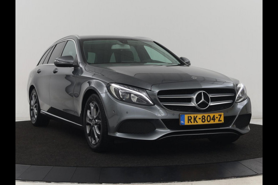 Mercedes-Benz C-Klasse 180 Business Solution | Stoelverwarming | Trekhaak | Camera | Navigatie | Park Assist | Half leder | Climate control | Full LED | Cruise control | Dodehoek detectie