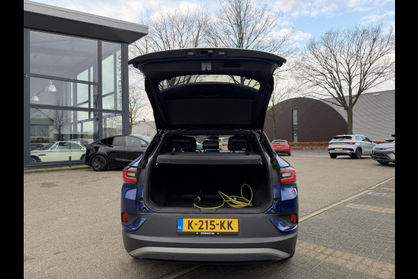 Volkswagen ID.4 First 77 kWh | VAN: 27.900,- VOOR: 24.877,- UW EINDEJAARSVOORDEEL: 3.023,- | CAMERA | 3 FASE | STOEL + STUURVERWARMING | RIJKLAAR INCL 12 MAANDEN BOVAG GARANTIE