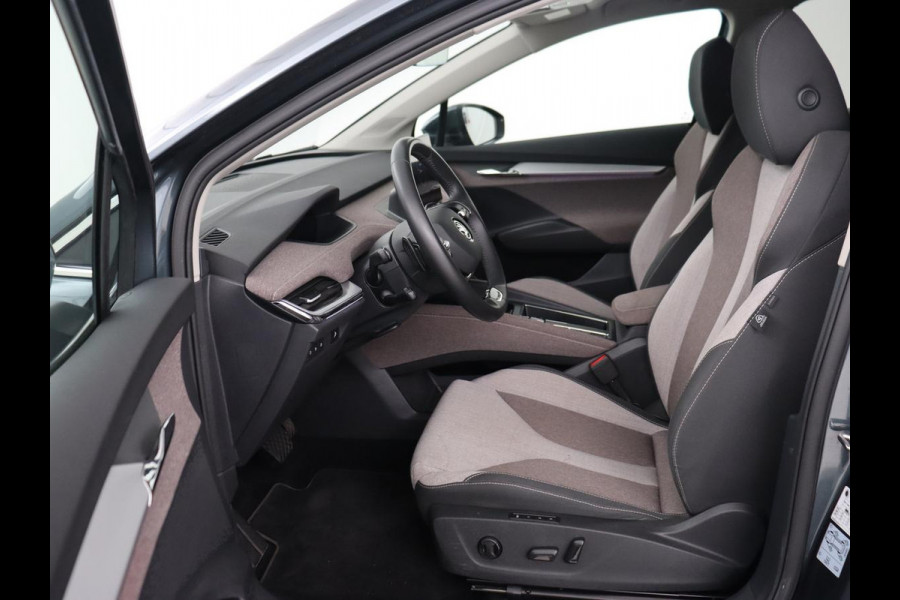 Škoda ENYAQ iV 80 | Warmtepomp | Trekhaak | Matrix LED | Adaptive cruise | Keyless | Camera | Half leder | Stuurverwarming | Memory | Navigatie | Climate control | Dodehoek detectie | Getint glas