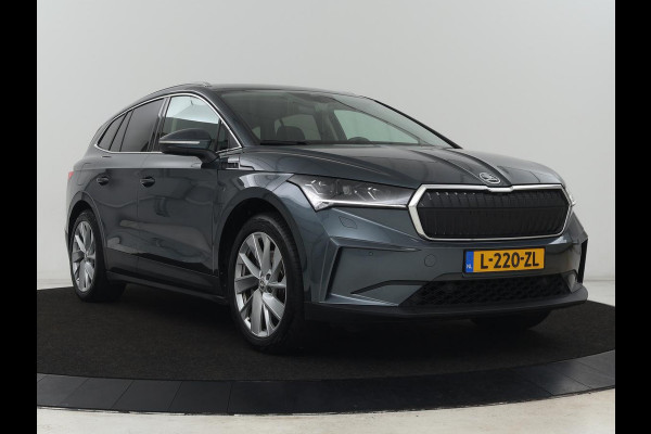 Škoda ENYAQ iV 80 | Warmtepomp | Trekhaak | Matrix LED | Adaptive cruise | Keyless | Camera | Half leder | Stuurverwarming | Memory | Navigatie | Climate control | Dodehoek detectie | Getint glas