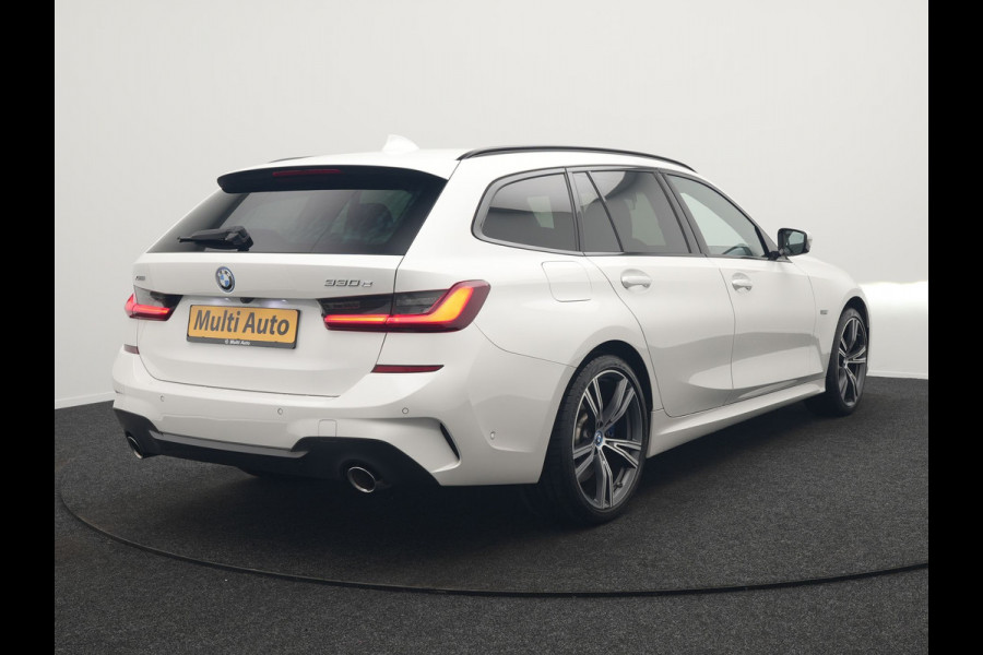 BMW 3 Serie Touring 330e xDrive M Sport Plug In Hybrid 293pk Dealer O.H. PHEV | Panodak | Head Up | Adaptive Cruise | Laser LED | 360 Camera | 19"L.M | Alcantara Sportstoelen Memory & Verwarmd | Sfeerverlichting | Apple Carplay | Keyless | Blis | Navigatie | Virtu