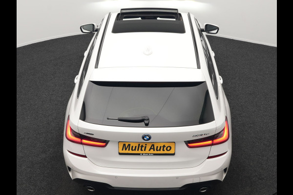BMW 3 Serie Touring 330e xDrive M Sport Plug In Hybrid 293pk Dealer O.H. PHEV | Panodak | Head Up | Adaptive Cruise | Laser LED | 360 Camera | 19"L.M | Alcantara Sportstoelen Memory & Verwarmd | Sfeerverlichting | Apple Carplay | Keyless | Blis | Navigatie | Virtu