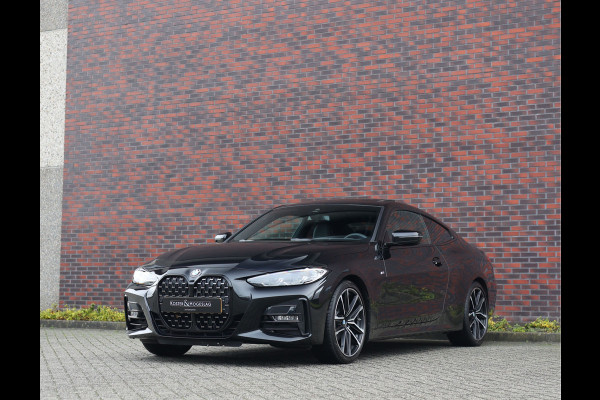 BMW 4 Serie Coupé 420i | M-Sport - HUD - Schuifdak