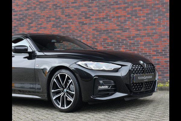 BMW 4 Serie Coupé 420i | M-Sport - HUD - Schuifdak