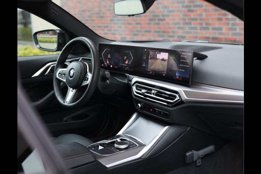 BMW 4 Serie Coupé 420i | M-Sport - HUD - Schuifdak