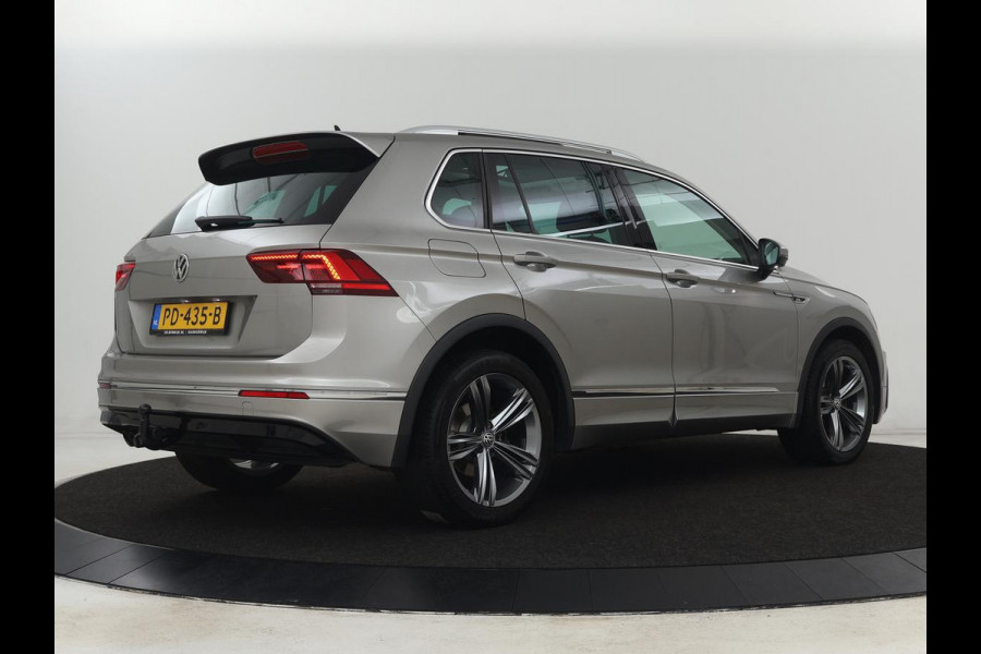 Volkswagen Tiguan 1.4 TSI R Line | 1e eigenaar | Panoramadak | Trekhaak | Stoelverwarming | Keyless | 19'' | Massage | Adaptive cruise | Navigatie | Full LED | Virtual Cockpit | Parkeerhulp | Climate control