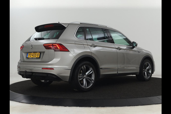Volkswagen Tiguan 1.4 TSI R Line | 1e eigenaar | Panoramadak | Trekhaak | Stoelverwarming | Keyless | 19'' | Massage | Adaptive cruise | Navigatie | Full LED | Virtual Cockpit | Parkeerhulp | Climate control