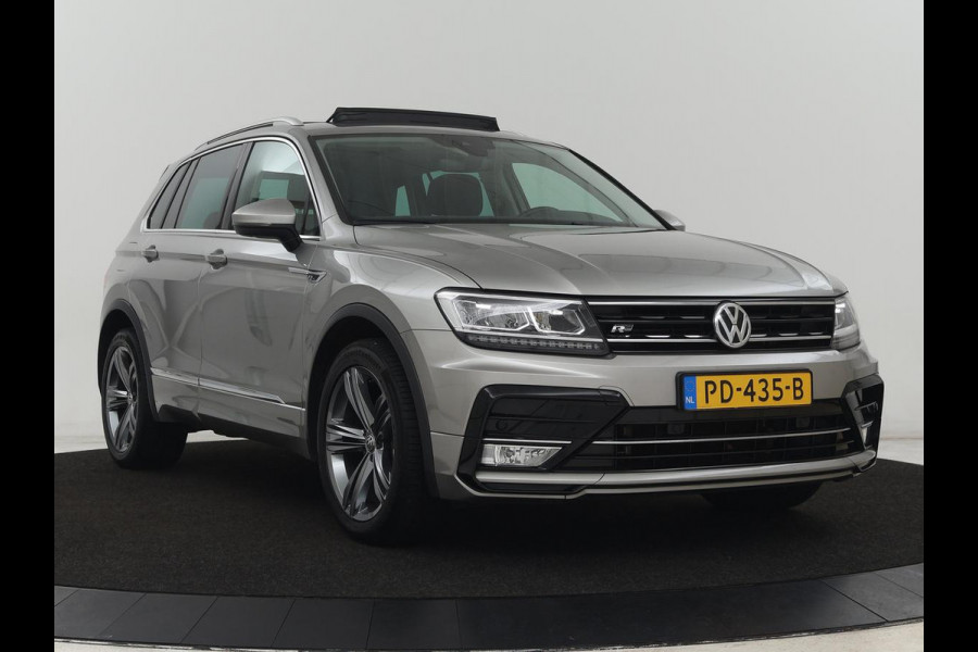 Volkswagen Tiguan 1.4 TSI R Line | 1e eigenaar | Panoramadak | Trekhaak | Stoelverwarming | Keyless | 19'' | Massage | Adaptive cruise | Navigatie | Full LED | Virtual Cockpit | Parkeerhulp | Climate control