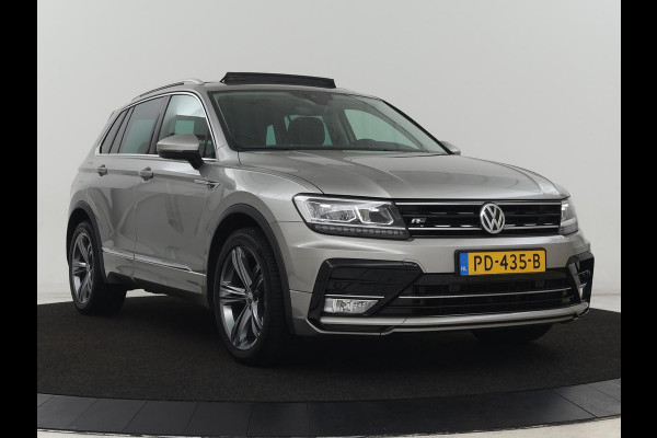 Volkswagen Tiguan 1.4 TSI R Line | 1e eigenaar | Panoramadak | Trekhaak | Stoelverwarming | Keyless | 19'' | Massage | Adaptive cruise | Navigatie | Full LED | Virtual Cockpit | Parkeerhulp | Climate control