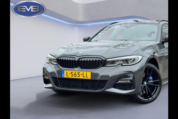 BMW 3 Serie Touring 330e M sport individual, dravitgrau, panoramadak ,laser,elec bedienbare trekhaak, vol opties, nl auto met nap
