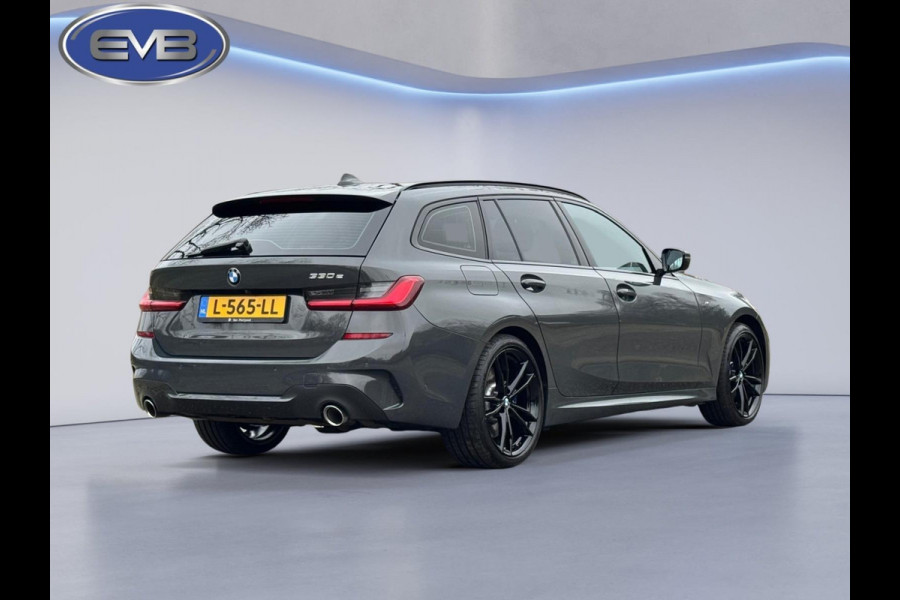 BMW 3 Serie Touring 330e M sport individual, dravitgrau, panoramadak ,laser,elec bedienbare trekhaak, vol opties, nl auto met nap