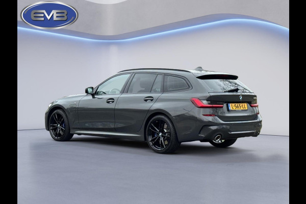 BMW 3 Serie Touring 330e M sport individual, dravitgrau, panoramadak ,laser,elec bedienbare trekhaak, vol opties, nl auto met nap