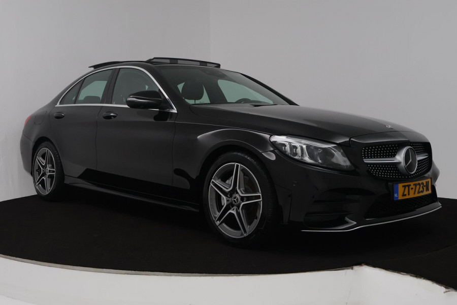 Mercedes-Benz C-Klasse 180 Business Solution AMG (PANORAMADAK, SFEERVERLICHTING, STOELVERWARMING, ACHTERUITRIJCAMERA, SENSOREN)