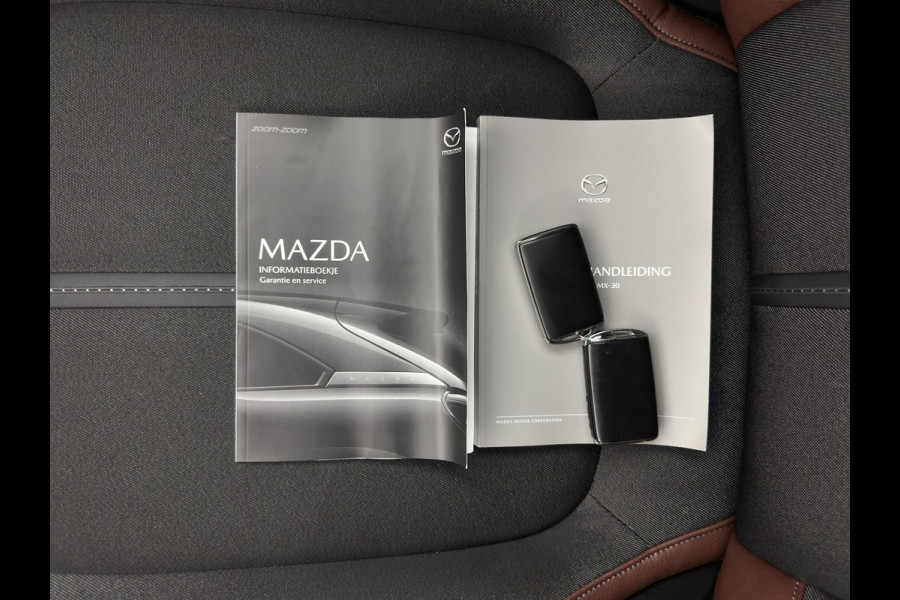 Mazda MX-30 e-SkyActiv 145 First Edition 36 kWh {SOH-94%} (INCL-BTW) Aut.*LEATHER-MICROFIBRE | FULL-LED | NAVI-FULLMAP | KEYLESS | BLIND-SPOT |  ADAPTIVE-CRUISE | HEAD-UP | CAMERA | DIGI-COCKPIT | MEMORY-PACK | SHIFT-PADDLES | 18"ALU*