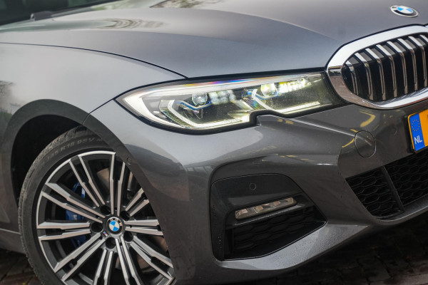 BMW 3 Serie Touring 330e High Executive M Sport Panodak Harman Kardon HUD Leer Alcantara