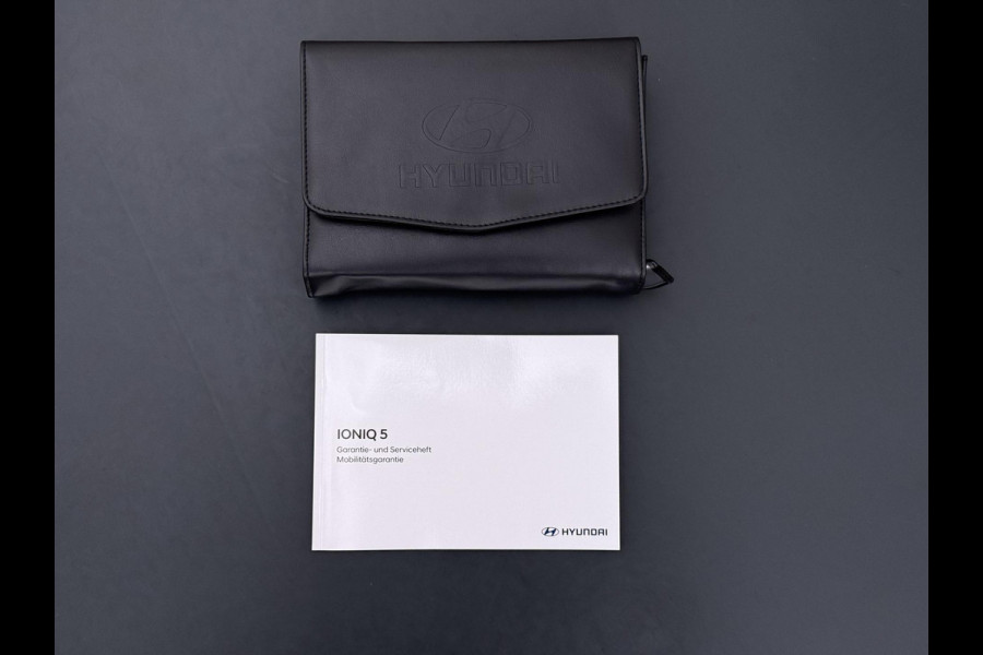 Hyundai IONIQ 5 Lounge AWD 77.4 kWh | SOH 100% RIJKLAAR! | FABRIEKSGARANTIE HYUNDAI TOT 10-2028| |STOELVERWARMING + VENTILATIE| DEALER OH. |ELEK. ACHTERKLEP| BOSE AUDIO| VOL OPTIES| ACHTERBANK VERWARMD| HEAD-UP