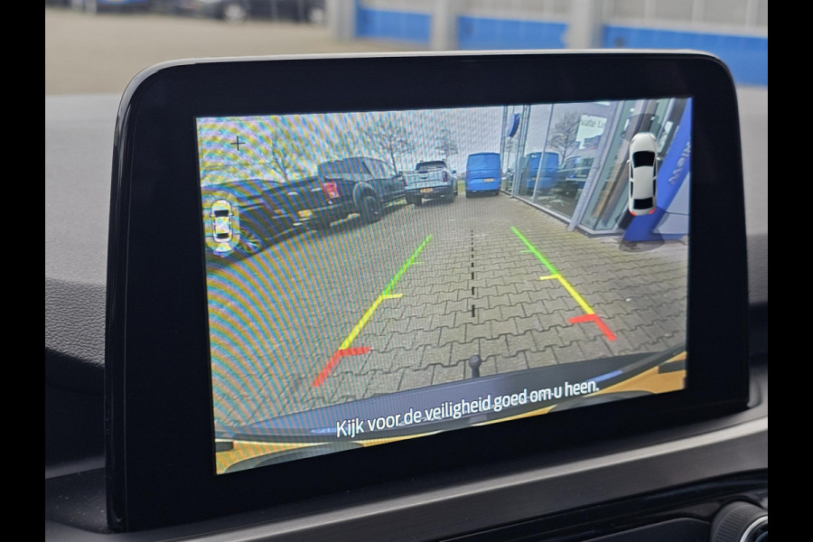 Ford Kuga 2.5 PHEV Titanium X 225 pk | Trekhaak | Adaptieve cruise control | Full led | Half Leder | Winterpack | Blind spot | Nette auto!