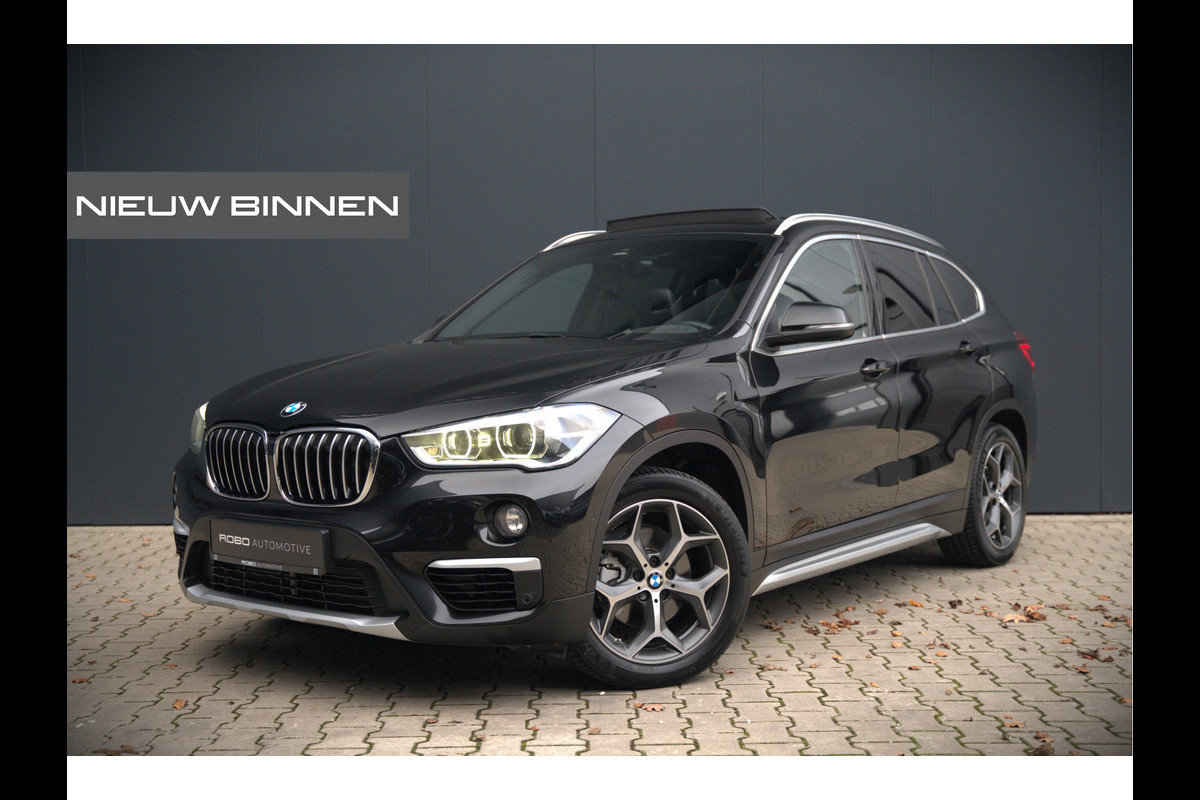 BMW X1 sDrive18i High Executive X Line | Panoramadak | Harman Kardon | Memory Seat | Head-Up Display | Leer | Stoelverwarming | Navigatie | Camera | Automaat | Digitale Tellers | Keyless | LED | Cruise Control | Parkeersensoren