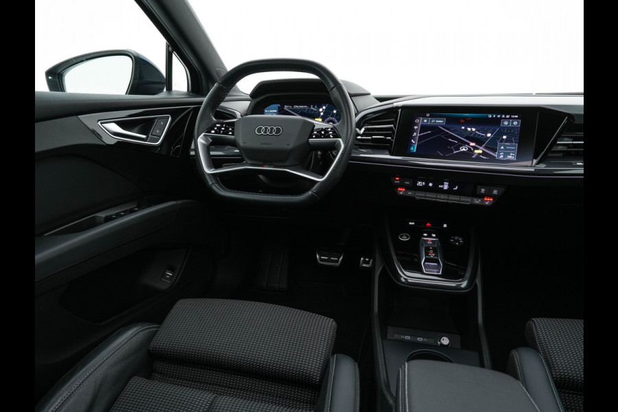 Audi Q4 e-tron 40 S-Line Competition Launch edition 77 kWh [ 3-Fase ] {SOH-87%} (INCL-BTW) *HEAT-PUMP | PANO | LEATHER-FABRIC | MATRIX-LED | ADAPTIVE-CRUISE | HEATED-SPORTSEATS | AMBIENT-LIGHT | DIGI-COCKPIT | CAMERA | KEYLESS | NAVI-FULLMAP | ...