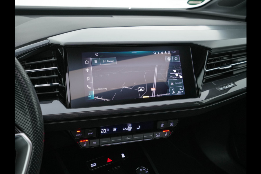 Audi Q4 e-tron 40 S-Line Competition Launch edition 77 kWh [ 3-Fase ] {SOH-87%} (INCL-BTW) *HEAT-PUMP | PANO | LEATHER-FABRIC | MATRIX-LED | ADAPTIVE-CRUISE | HEATED-SPORTSEATS | AMBIENT-LIGHT | DIGI-COCKPIT | CAMERA | KEYLESS | NAVI-FULLMAP | ...