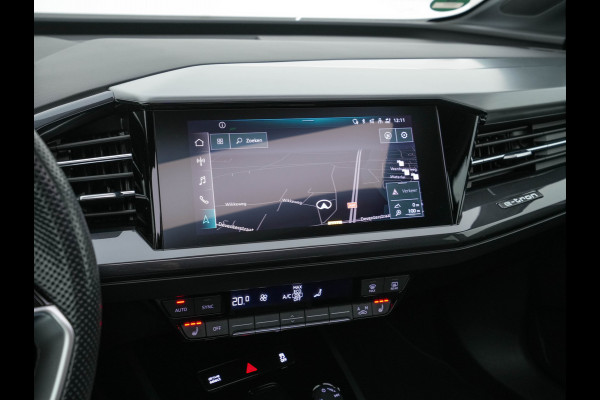 Audi Q4 e-tron 40 S-Line Competition Launch edition 77 kWh [ 3-Fase ] {SOH-87%} (INCL-BTW) *HEAT-PUMP | PANO | LEATHER-FABRIC | MATRIX-LED | ADAPTIVE-CRUISE | HEATED-SPORTSEATS | AMBIENT-LIGHT | DIGI-COCKPIT | CAMERA | KEYLESS | NAVI-FULLMAP | ...
