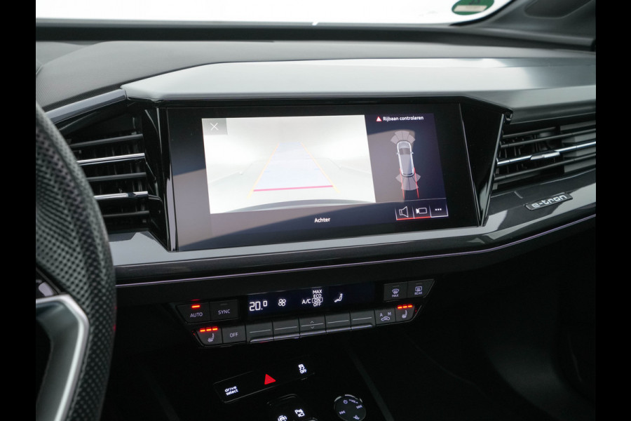 Audi Q4 e-tron 40 S-Line Competition Launch edition 77 kWh [ 3-Fase ] {SOH-87%} (INCL-BTW) *HEAT-PUMP | PANO | LEATHER-FABRIC | MATRIX-LED | ADAPTIVE-CRUISE | HEATED-SPORTSEATS | AMBIENT-LIGHT | DIGI-COCKPIT | CAMERA | KEYLESS | NAVI-FULLMAP | ...