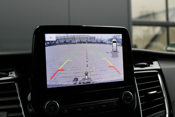 Ford Tourneo Custom 320 2.0 TDCI L2H1 185pk - 2x Schuif - Xenon - Trekhaak - Standkachel - Leder - Camera - Carplay - Blindspot - Rijklaar