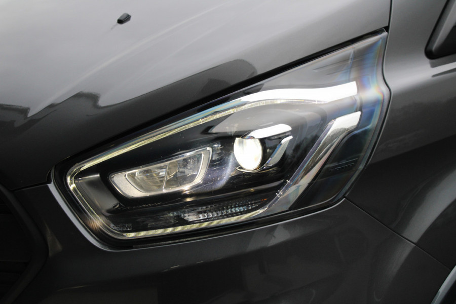 Ford Tourneo Custom 320 2.0 TDCI L2H1 185pk - 2x Schuif - Xenon - Trekhaak - Standkachel - Leder - Camera - Carplay - Blindspot - Rijklaar