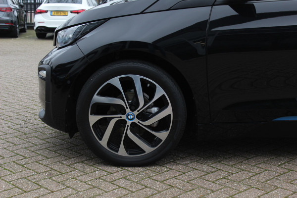 BMW i3 Basis 120Ah 42 kWh / SoH 91.4% / Navigatie / 19'' / Parkeerhulp achter / Navigatie / Harman Kardon / Stoelverwarming / Cruise Control / Warmtepomp / Getint glas