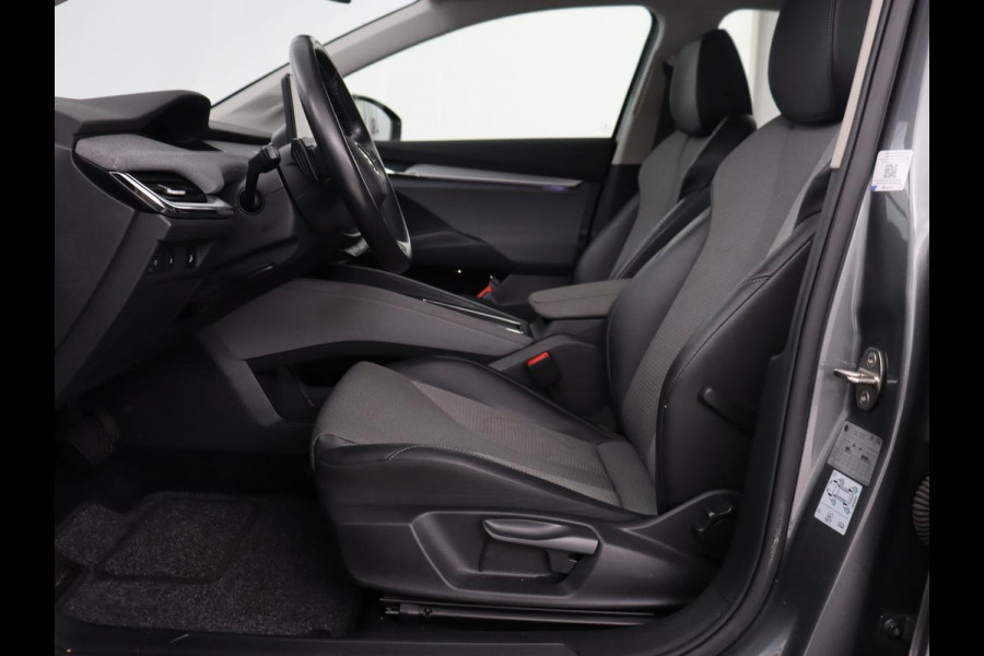 Škoda ENYAQ iV 80 | Stoel & stuurverwarming | Carplay | Keyless | Navigatie | Camera | Half leder | Cruise control | Full LED | Parkeerhulp