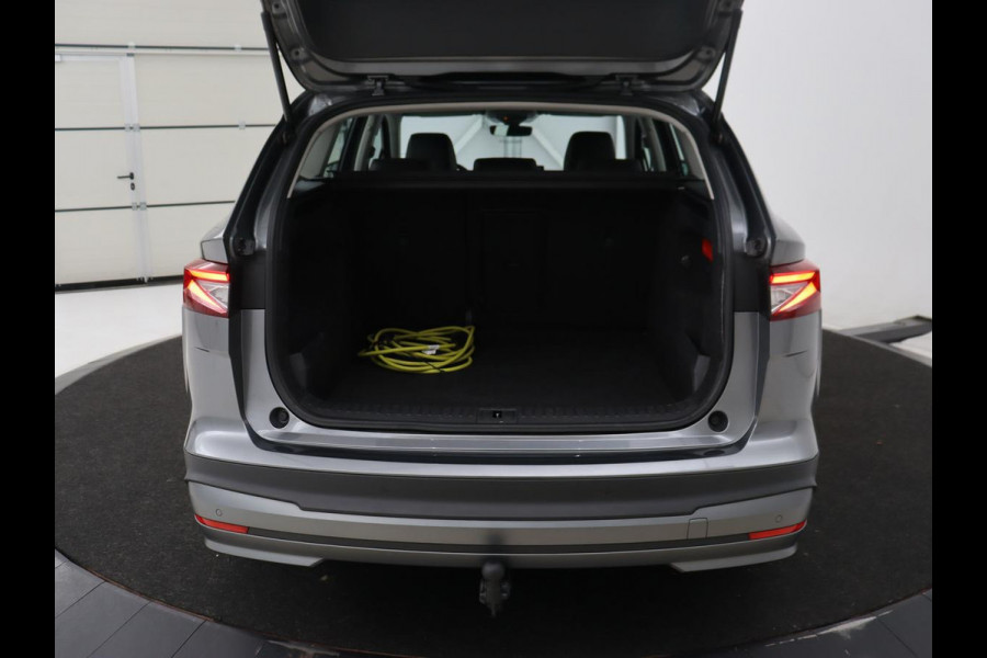 Škoda ENYAQ iV 80 | Stoel & stuurverwarming | Carplay | Keyless | Navigatie | Camera | Half leder | Cruise control | Full LED | Parkeerhulp