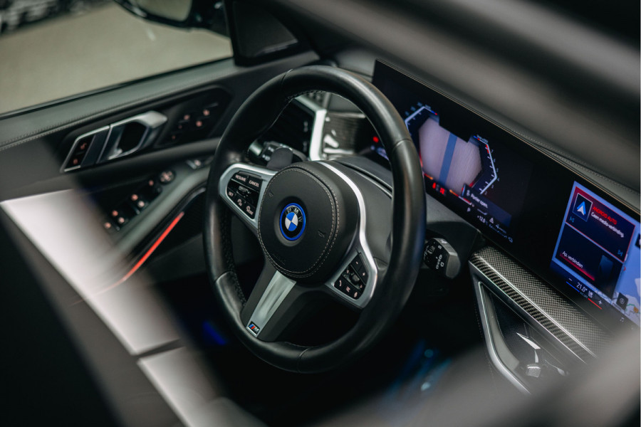 BMW X5 xDrive50e | M uitgevoerd | Trekhaak | Alcantara hemel | Luchtvering | Full PPF in- en exterieur | Skylounge |