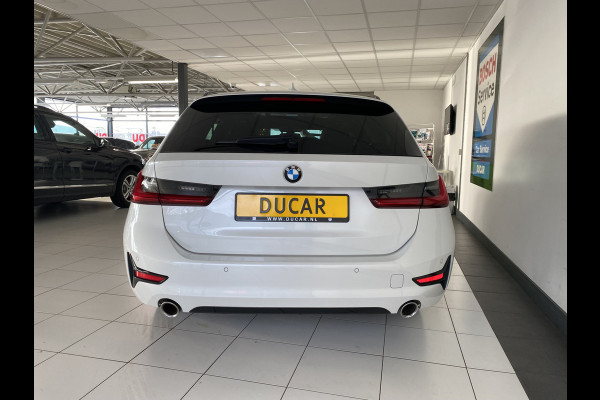 BMW 3 Serie Touring 320e Sportline Panoramadak / Led verlichting / Carplay/ Wit metallic /