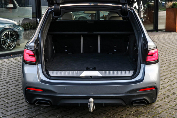 BMW 5 Serie Touring 530e xDrive M-Sport | Trekhaak | Pano | Soft close | Laser | Massage | Ambient Air | Head Up | Achterassturing