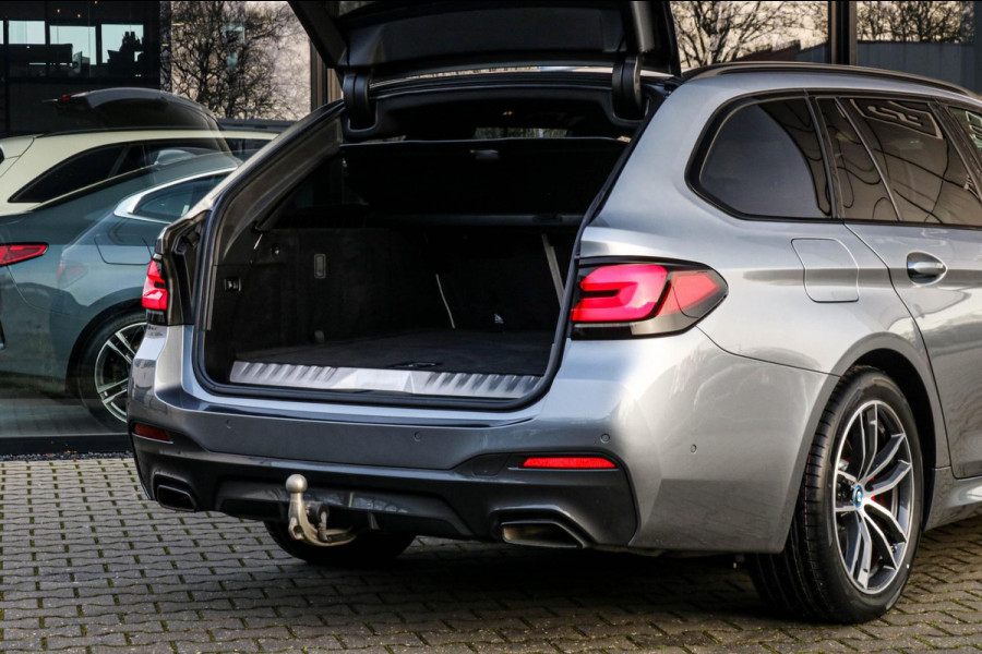 BMW 5 Serie Touring 530e xDrive M-Sport | Trekhaak | Pano | Soft close | Laser | Massage | Ambient Air | Head Up | Achterassturing