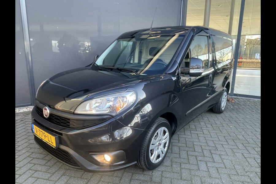Fiat Doblò Cargo 1.6 MJ L1H1 SX Airco - Bluetooth - Parkeersensoren achter - Radio - Tussenschot volledig - Zijschuifdeur rechts - Stuur multifunctioneel - Mistlampen voor - Elektrische ramen voor