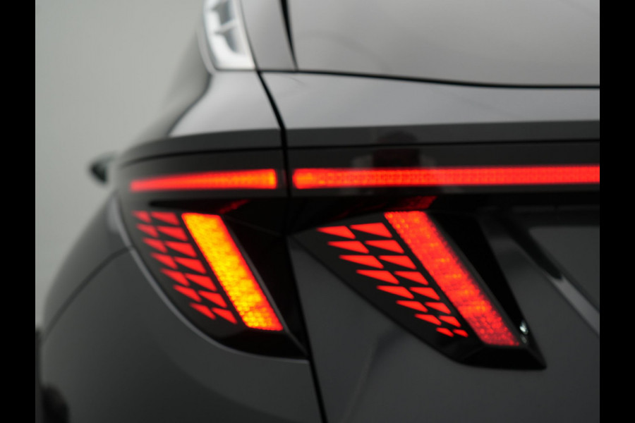 Hyundai Tucson 1.6 T-GDI Premium 4WD 265Pk Plug In Hybrid PHEV | Trekhaak | Sportstoelen Memory & Ventilatie | Adaptive Cruise | Navigatie | Camera | Apple Carplay | DAB | Virtual | L.M. 19" |